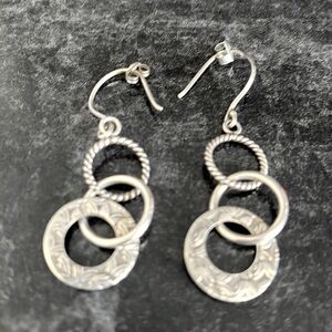 Beautiful silver hanging Silpada earrings.